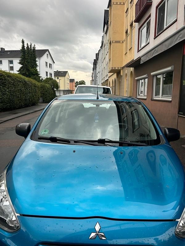 Blau Gebraucht 2013 Mitsubishi Space Star Kleinwagen | 3.500 € - Bild 1/3