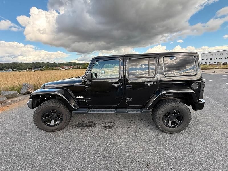Schwarz Gebraucht 2015 Jeep Wrangler Sahara SUV | 25.000 € (Fairer Preis) - Bild 1/4