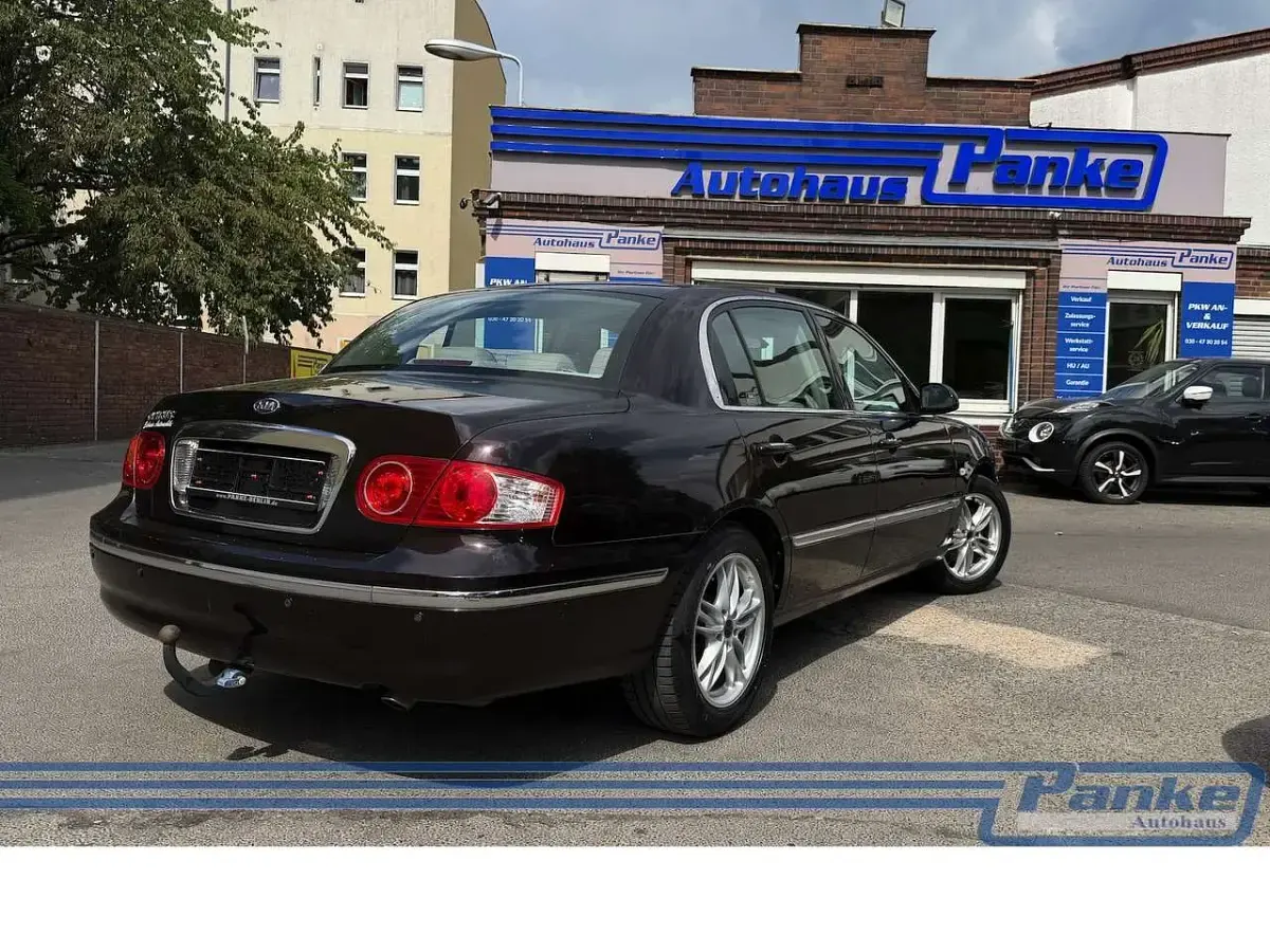 Gebraucht Kia Opirus 203 PS (149 kW) 2005 Rot Limousine