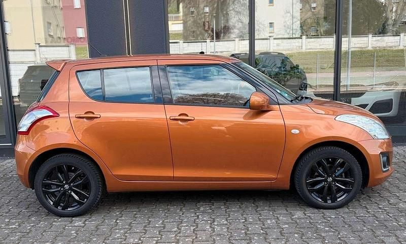 Gebraucht Suzuki Swift Comfort 94 PS (69 kW) 2016 Orange Kleinwagen