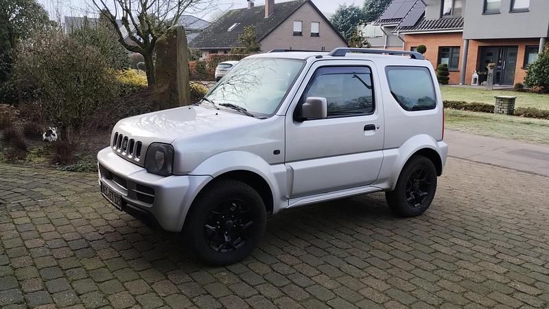 Silber Gebraucht 2012 Suzuki Jimny SUV | 8.900 € (Fairer Preis) - Bild 1/4