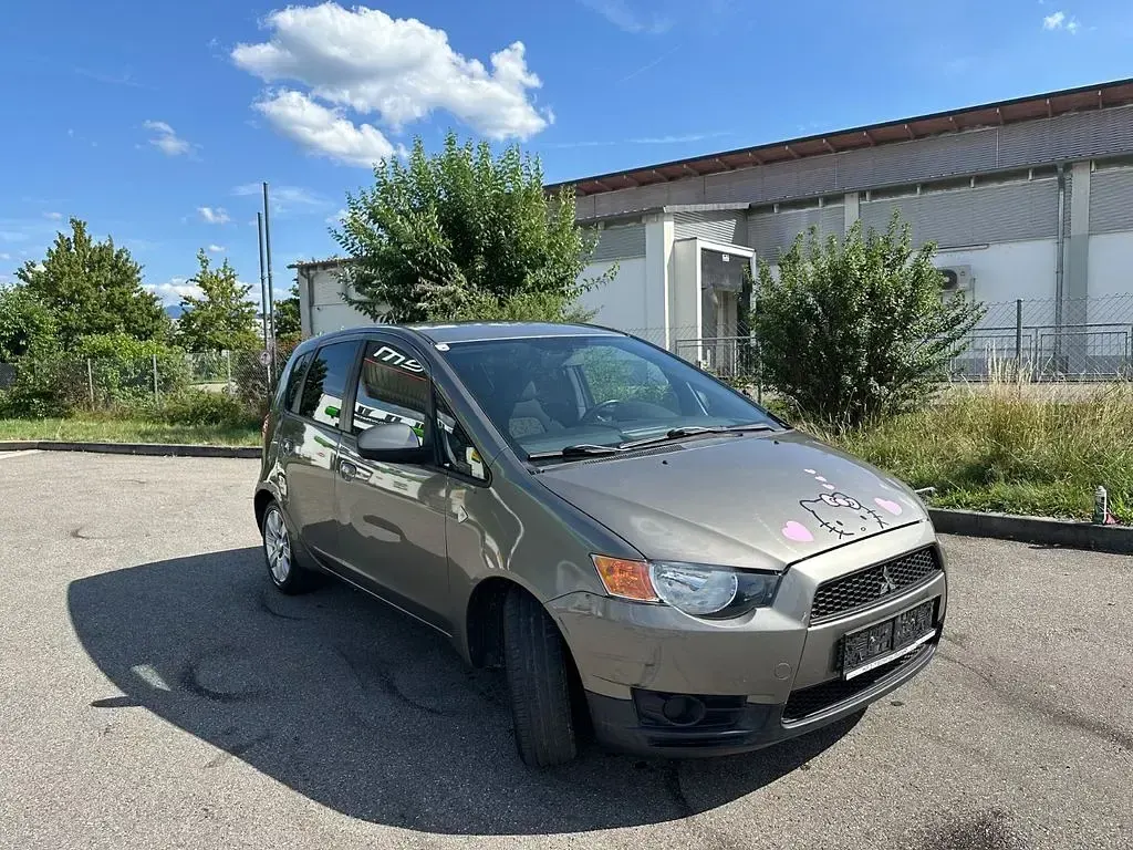 Gebraucht Mitsubishi Colt Inform 75 PS (55 kW) 2013 Braun Limousine