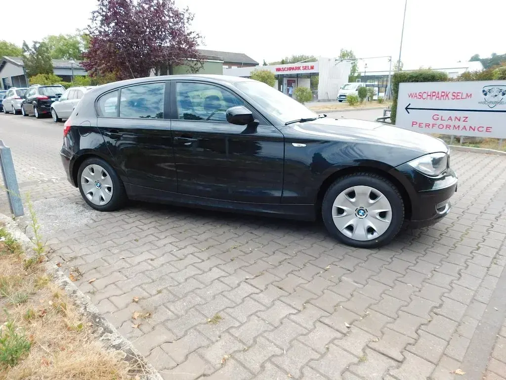 Gebraucht BMW 116 Advantage 122 PS (89 kW) 2010 Schwarz Kleinwagen