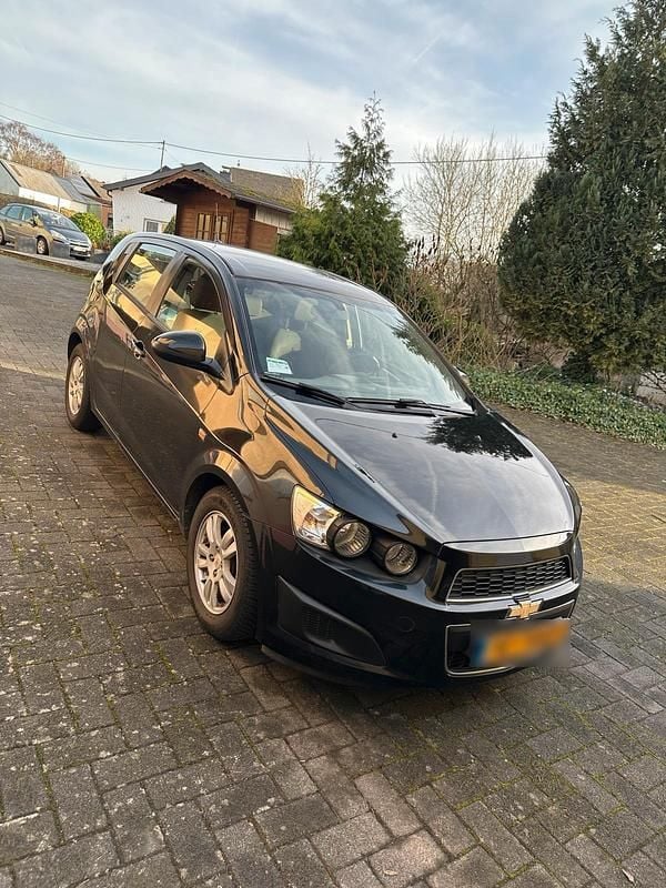Gebraucht Chevrolet Aveo 101 PS (74 kW) 2012 Schwarz Kleinwagen