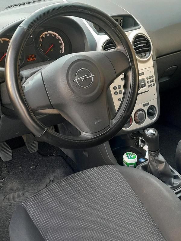 Second-hand Opel Corsa 60 CP (44 kW) 2009 Albastru Hatchback