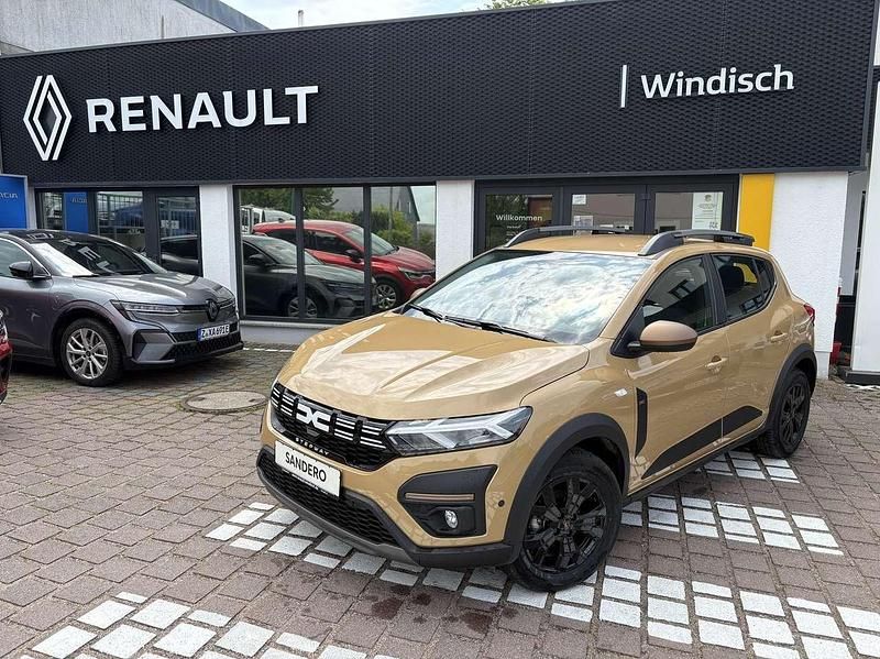 Safaribeige Gebraucht 2024 Dacia Sandero Extreme Kleinwagen | 21.320 € - Bild 1/4