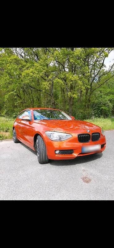 Gebraucht BMW 114 102 PS (75 kW) 2012 Orange Kleinwagen