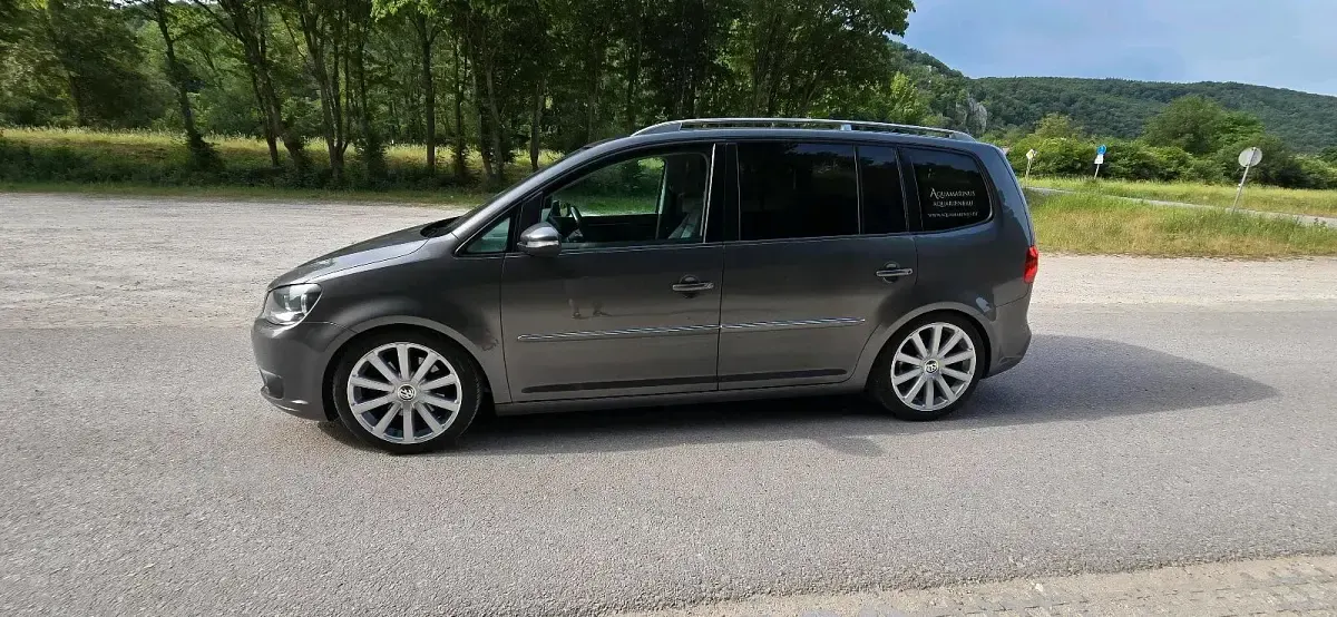 Gebraucht VW Touran Highline 170 PS (125 kW) 2012 Silber Van / Kleinbus