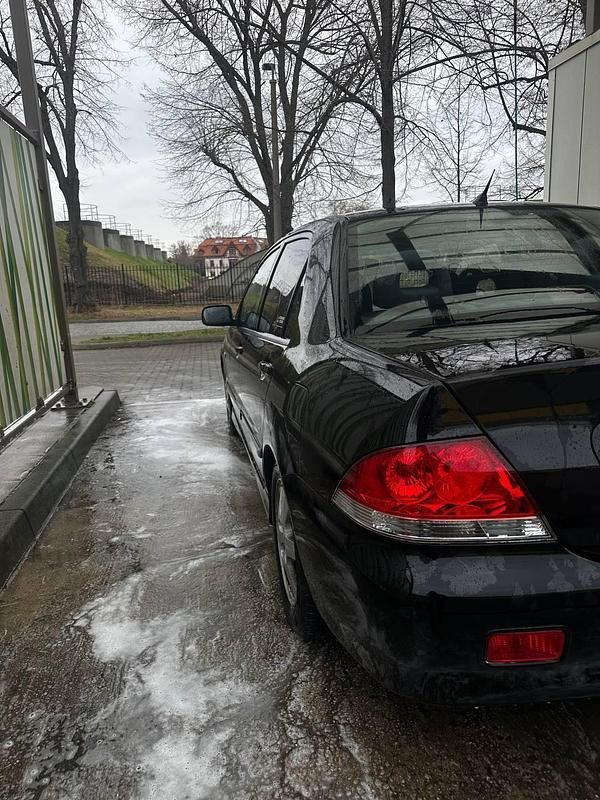 Gebraucht Mitsubishi Lancer 98 PS (72 kW) 2007 Schwarz Limousine