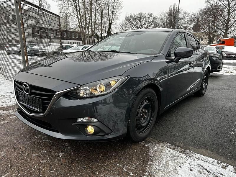 Grau Gebraucht 2015 Mazda 3 Center-Line Limousine | 7.990 € (Guter Preis) - Bild 1/4