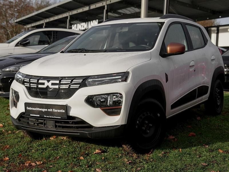 Gebraucht Dacia Spring Extreme 47 kW (65 PS) 2023 Polarweiss Kleinwagen