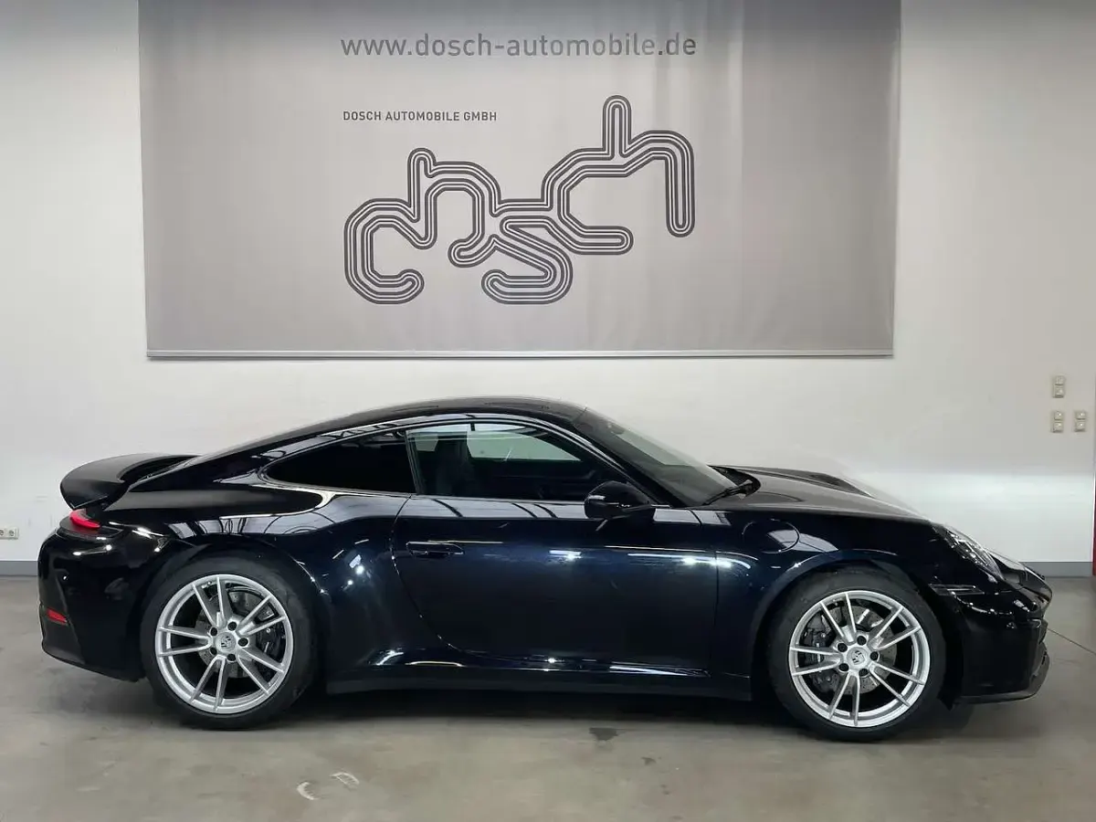 Gebraucht Porsche 911 Carrera 394 PS (289 kW) 2025 Tiefschwarz Coupé