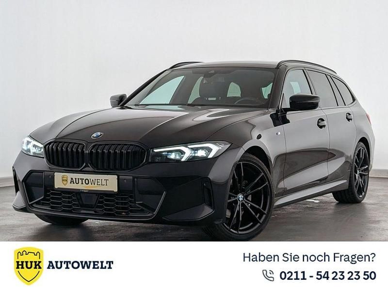 Black sapphire Gebraucht 2023 BMW 320 M Sport Kombi | 36.860 € (Fairer Preis) - Bild 1/3