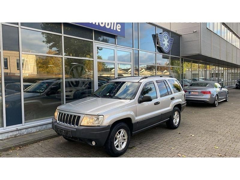 Silbermetallic (metallic) Gebraucht 2005 Jeep Grand Cherokee SUV | 4.990 € - Bild 1/4