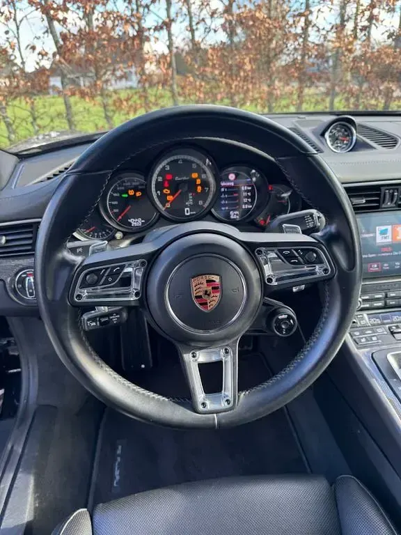 Begagnad Porsche 991 540 HK (397 kW) 2018 Svart Cab