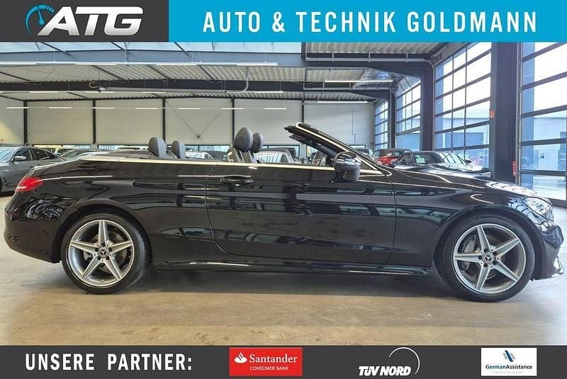 Obsidianschwarz Gebraucht 2018 Mercedes C220 AMG line Cabrio | 28.950 € (Fairer Preis) - Bild 1/4