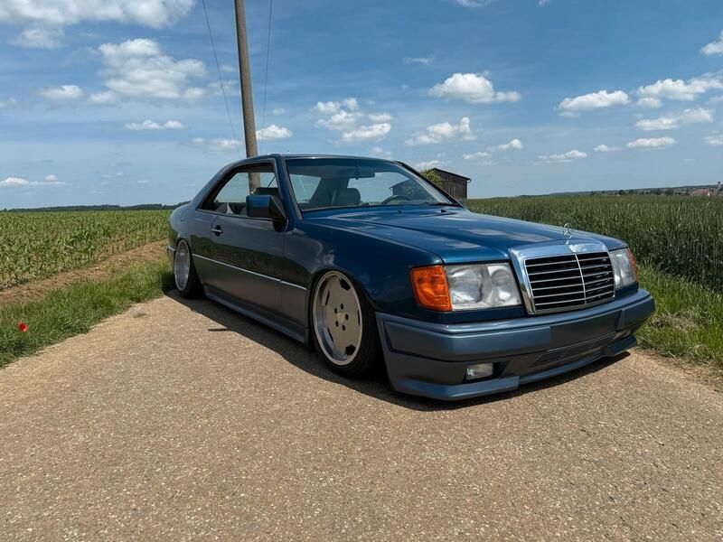 Blau Gebraucht 1989 Mercedes E300 AMG Coupé | 21.900 € - Bild 1/4