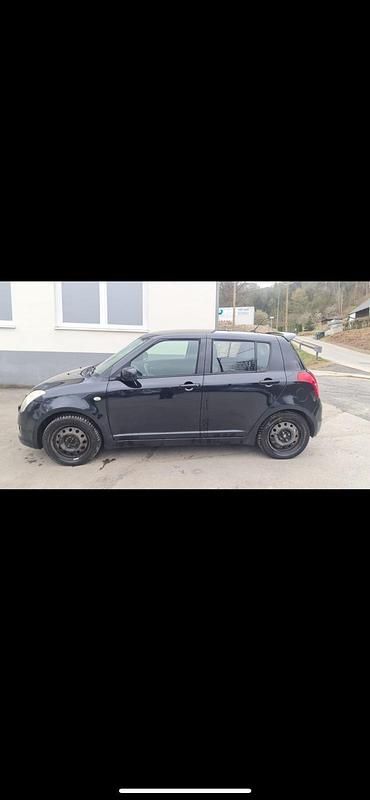 Second-hand Suzuki Swift 92 CP (67 kW) 2009 Albastru Hatchback