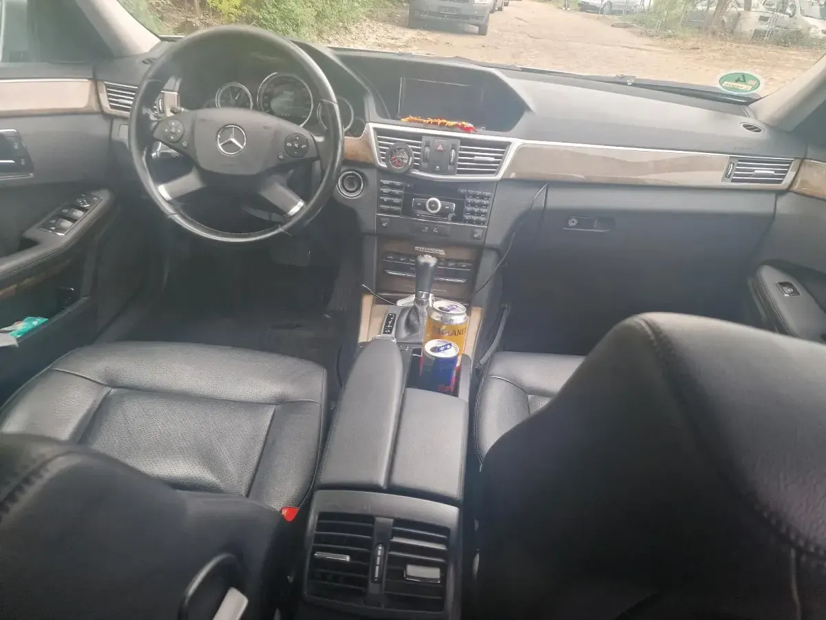 Second-hand Mercedes E250 150 CP (110 kW) 2009 Argintiu Berlinǎ