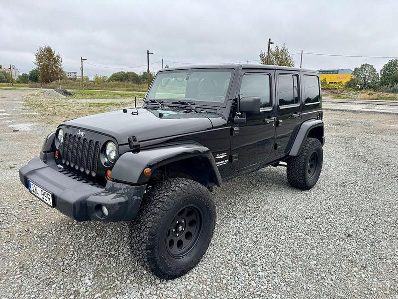 Schwarz Gebraucht 2012 Jeep Wrangler Sahara SUV | 19.900 € (Etwas zu teuer) - Bild 1/4