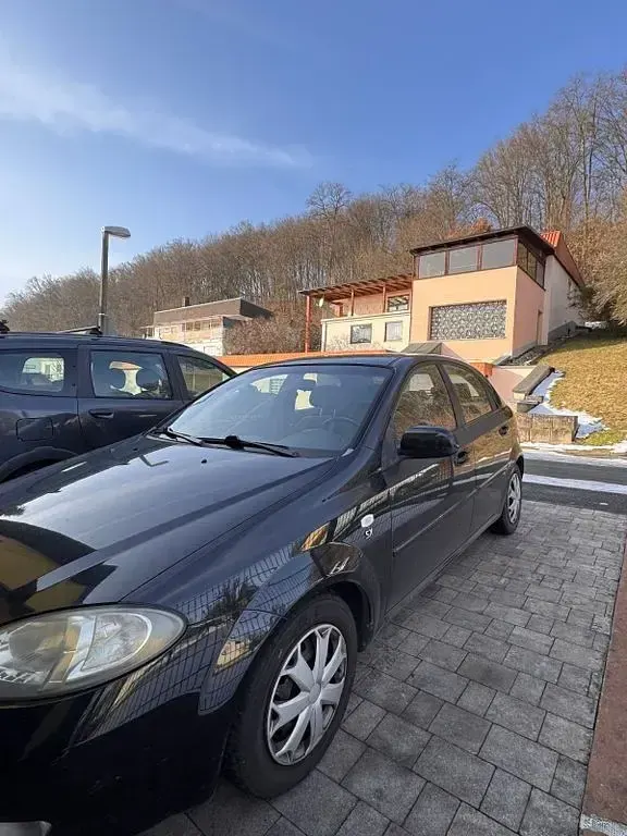 Gebraucht Chevrolet Lacetti 109 PS (80 kW) 2010 Schwarz Kleinwagen