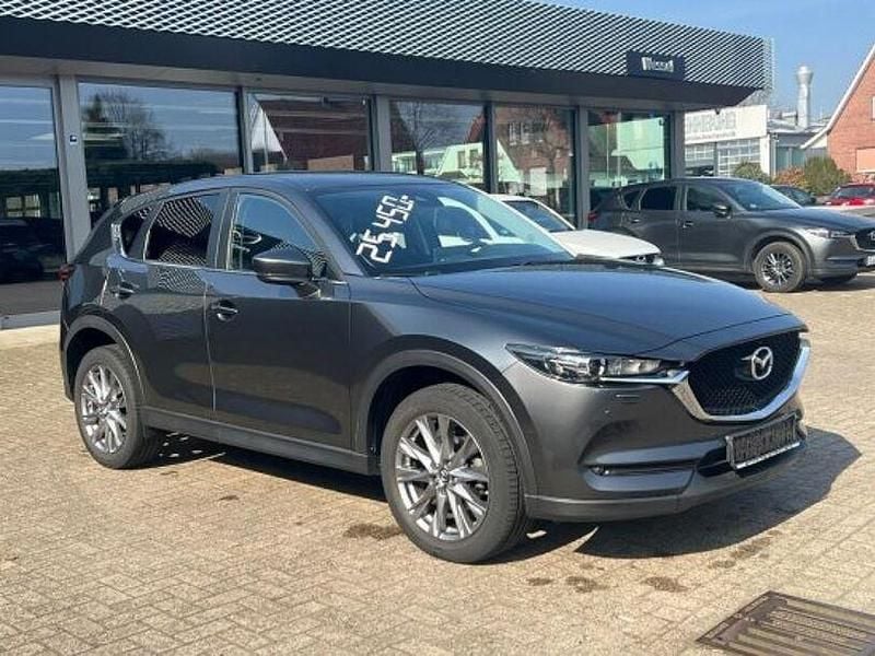 Machine grey (metallic) Gebraucht 2021 Mazda CX-5 SUV | 23.950 € (Fairer Preis) - Bild 1/4