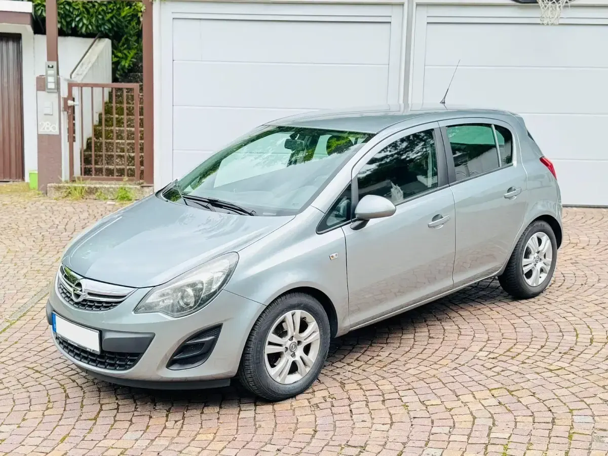 Używany Opel Corsa 101 KM (74 kW) 2012 Szary Hatchback