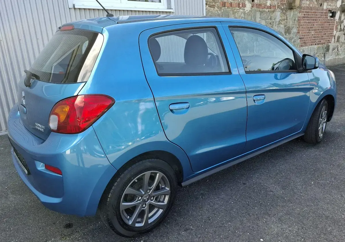 Gebraucht Mitsubishi Space Star Diamant Edition 71 PS (52 kW) 2015 Blau Kleinwagen