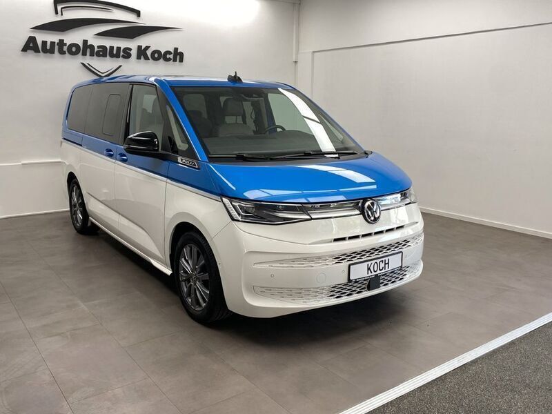 Medium blue metallic/ candywe Gebraucht 2023 VW T7 Style Van | 62.900 € (Teuer) - Bild 1/4