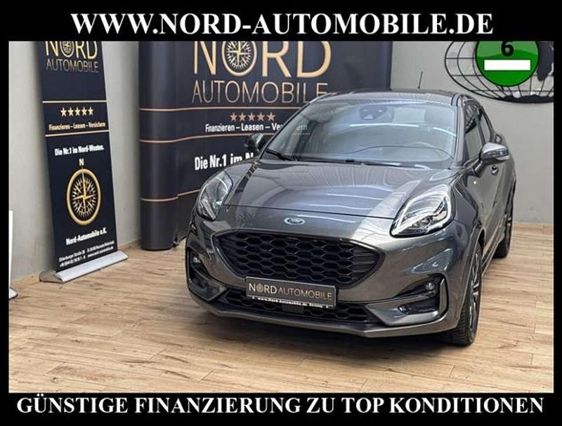 Grau (magneticgrau metallic)) (metallic) Gebraucht 2023 Ford Puma Gen-E ST-Line SUV | 13.890 € (Superpreis) - Bild 1/3