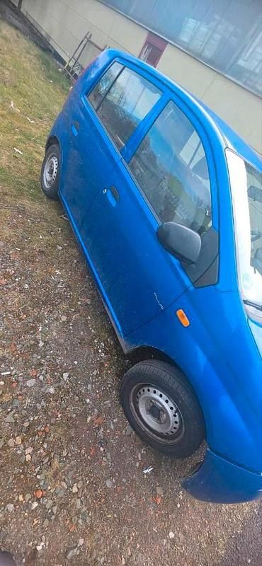 Gebraucht Daihatsu Cuore 58 PS (42 kW) 2004 Blau Kleinwagen