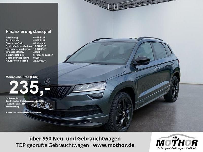 Grau Gebraucht 2021 Skoda Karoq SportLine SUV | 21.965 € (Fairer Preis) - Bild 1/4