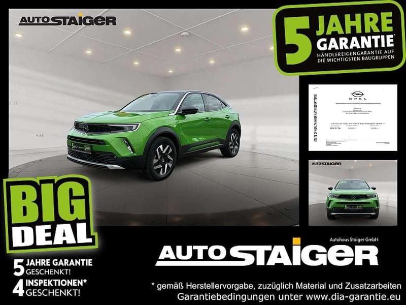 Matcha green Gebraucht 2021 Opel Mokka-e Elegance SUV | 14.812 € (Fairer Preis) - Bild 1/4