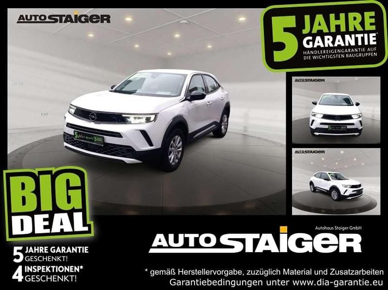 Jade weiss Gebraucht 2023 Opel Mokka Enjoy SUV | 15.990 € (Guter Preis) - Bild 1/4