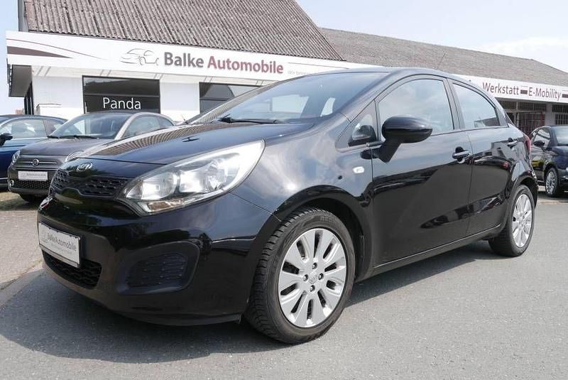 Midnightblack met. Gebraucht 2012 Kia Rio Edition 7 Kleinwagen | 4.990 € (Fairer Preis) - Bild 1/4