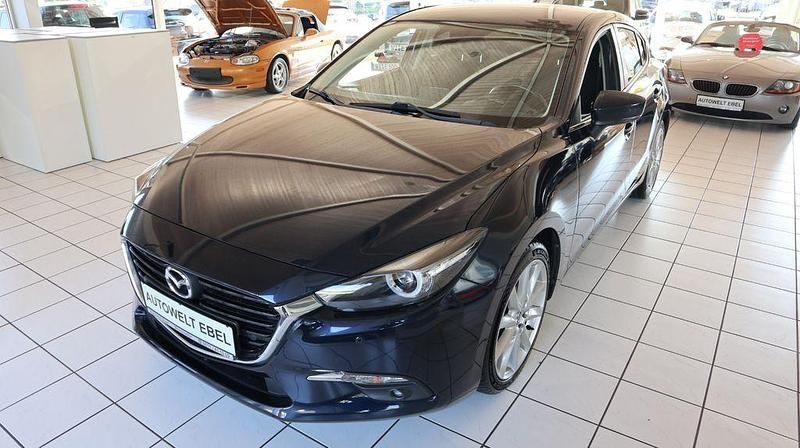 Blau Gebraucht 2018 Mazda 3 Limousine | 16.410 € (Etwas zu teuer) - Bild 1/4