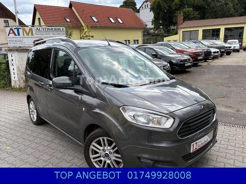 Grau Gebraucht 2018 Ford Tourneo Courier Titanium Van / Kleinbus | 10.999 € (Guter Preis) - Bild 1/4