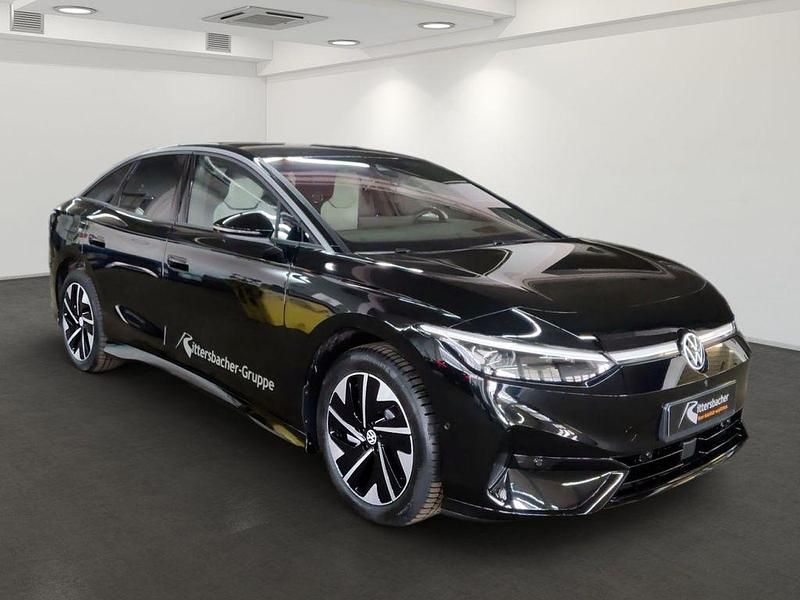 Gebraucht VW ID.7 Pro 210 kW (286 PS) 2024 Grenadillschwarz metallic Kleinwagen