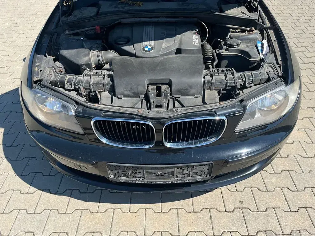 Gebraucht BMW 116 116 PS (85 kW) 2010 Schwarz Kleinwagen