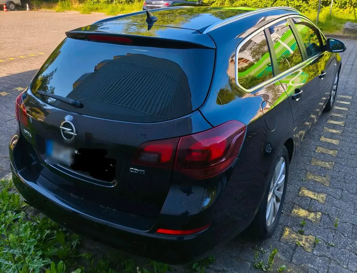 Gebraucht Opel Astra 160 PS (117 kW) 2011 Schwarz Kombi