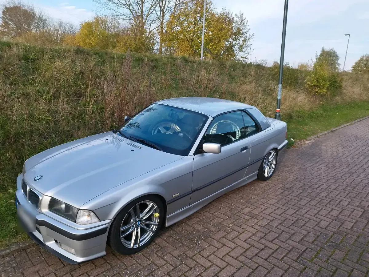 Gebraucht BMW 318 Cabriolet Basis 115 PS (84 kW) 1997 Silber Cabrio