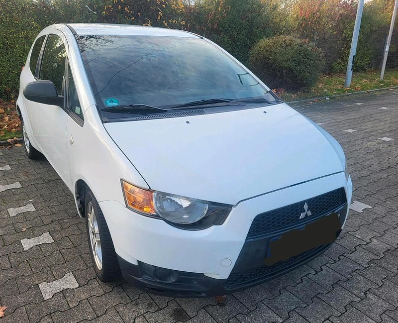 Weiß Gebraucht 2009 Mitsubishi Colt Kleinwagen | 2.390 € (Fairer Preis) - Bild 1/4