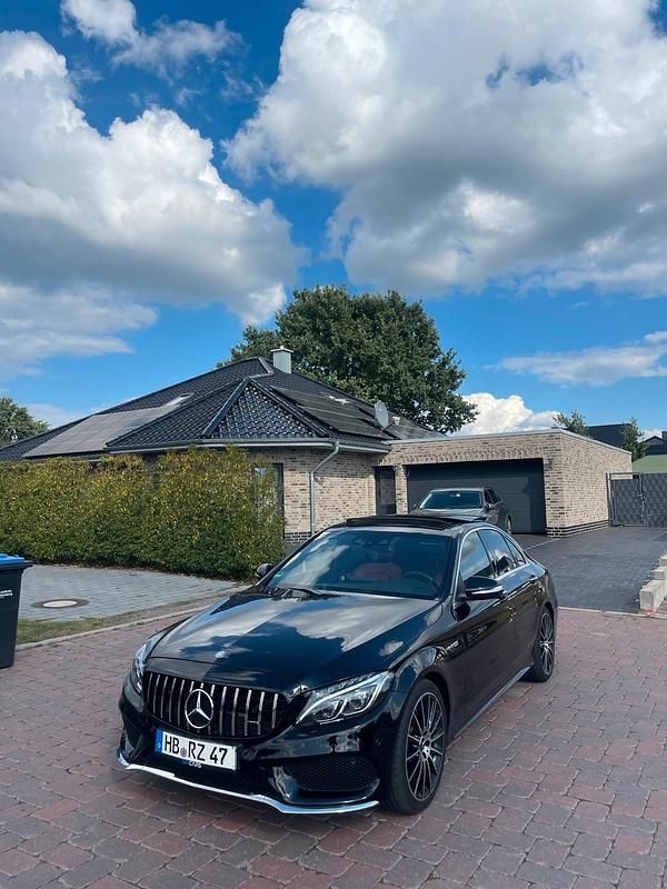 Schwarz Gebraucht 2015 Mercedes C220 AMG line Limousine | 21.900 € - Bild 1/4