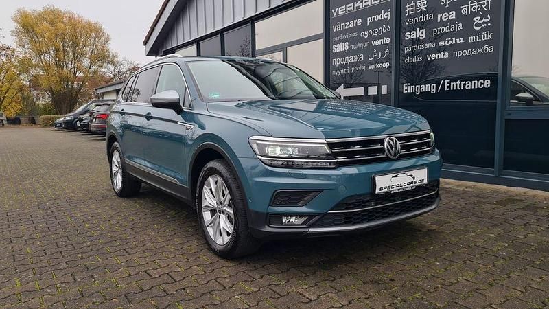 Petroleum blue metallic Gebraucht 2019 VW Tiguan Allspace Highline SUV | 23.490 € (Fairer Preis) - Bild 1/4