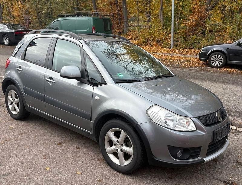 Usado Suzuki SX4 107 HP (78 kW) 2006 Cinzento Sedan