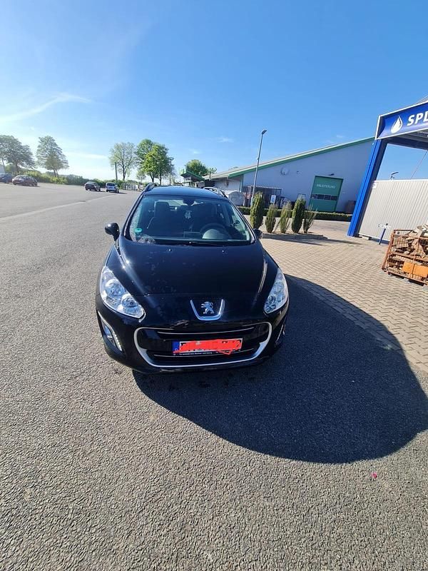 Schwarz Gebraucht 2013 Peugeot 308 Kombi | 3.499 € - Bild 1/4