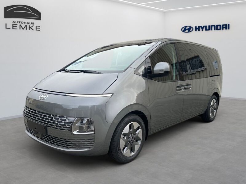 Olivine grey metallic Neu 2024 Hyundai Staria Prime Van | 53.490 € - Bild 1/4