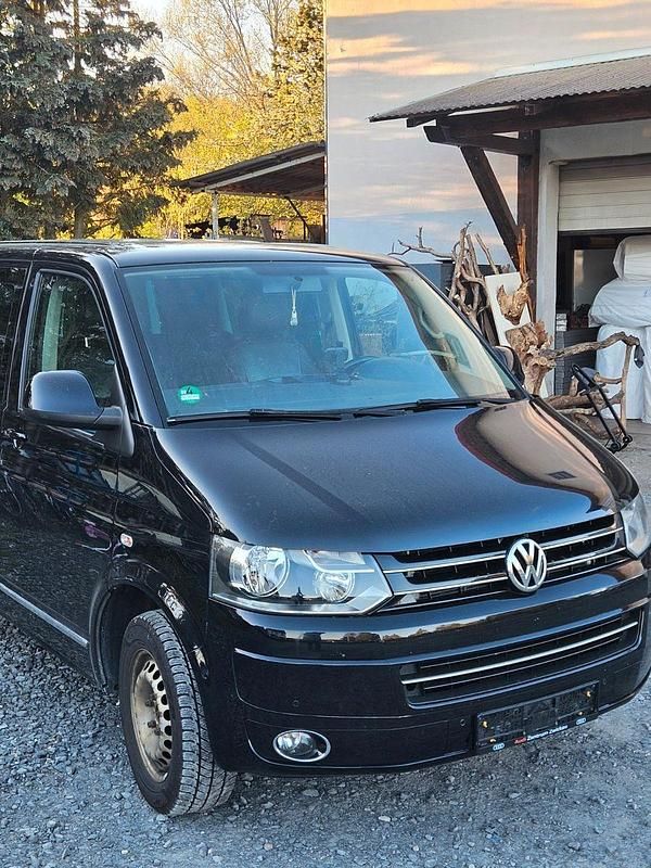 Second-hand VW Caravelle 140 CP (102 kW) 2014 Negru Van