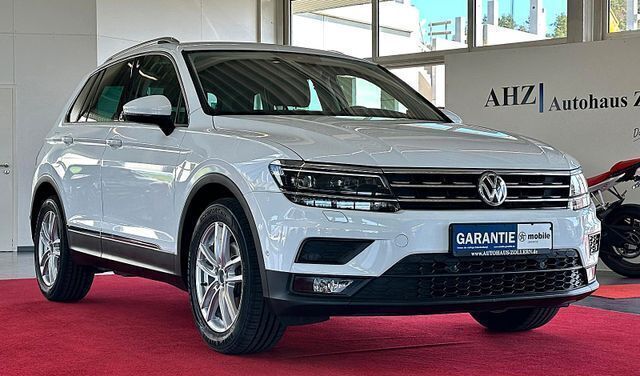 Pure white Gebraucht 2018 VW Tiguan Sound SUV | 19.999 € (Guter Preis) - Bild 1/4