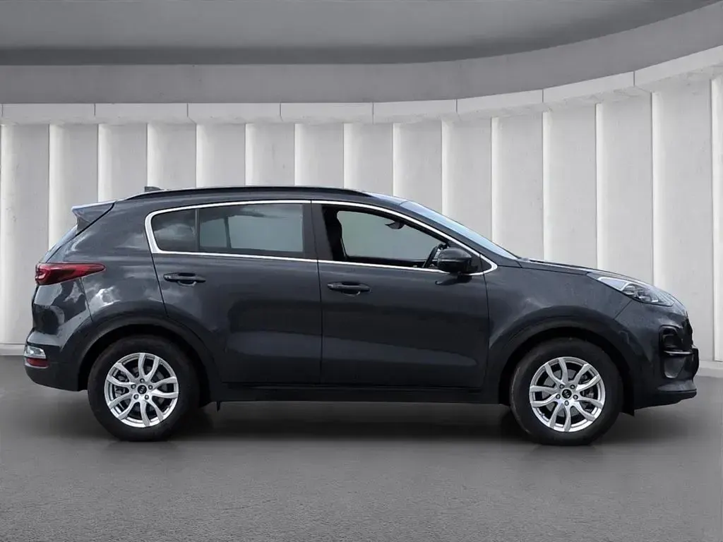 Gebraucht Kia Sportage 136 PS (100 kW) 2021 H8g) pentametal met. (grau SUV